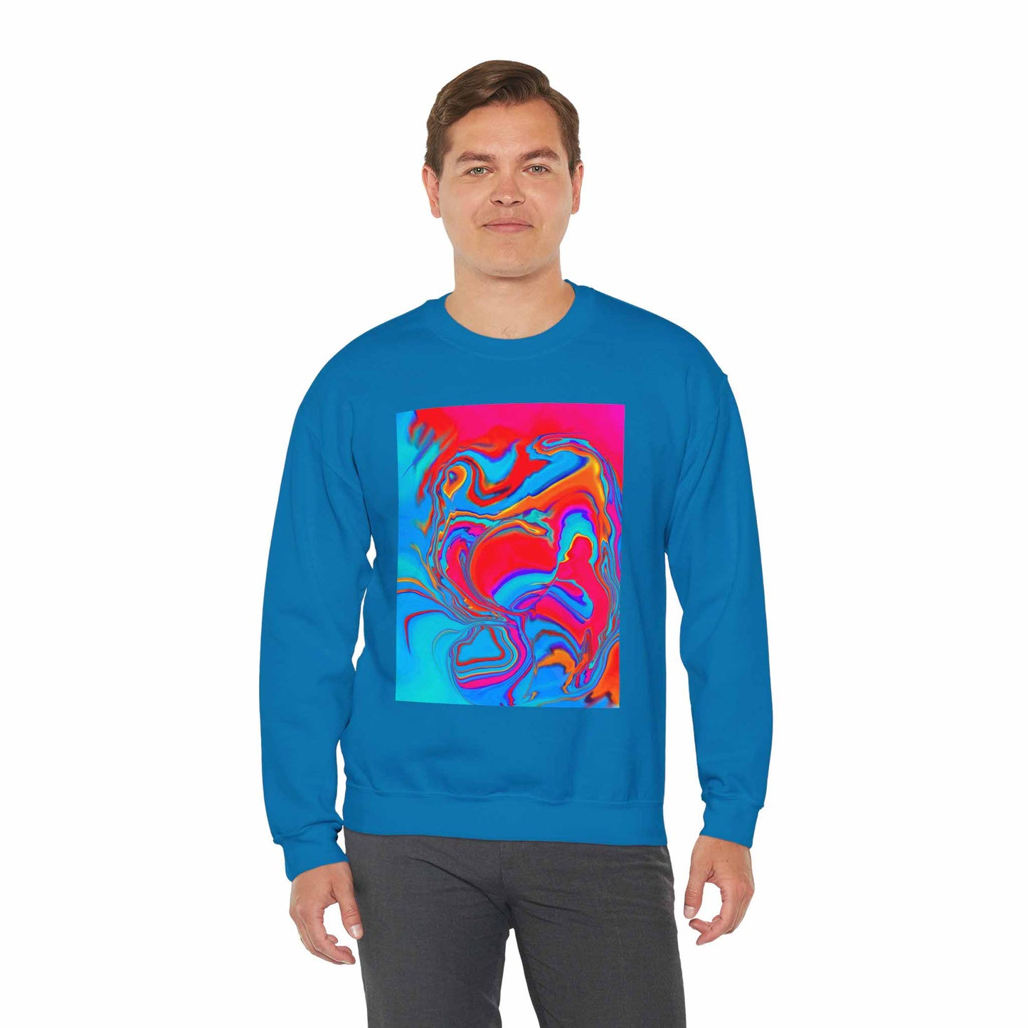 Man wearing a sapphire blue sweatshirt with a colorful abstract design on a white background