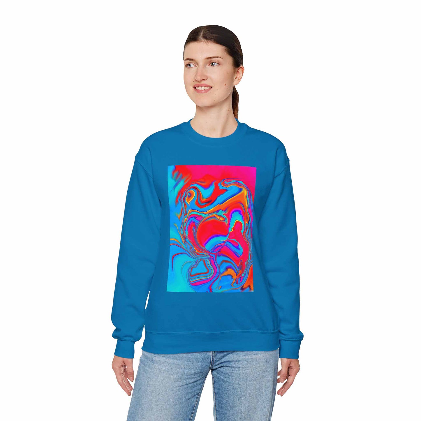 Person wearing a sapphire blue sweatshirt with a colorful abstract design on a white background