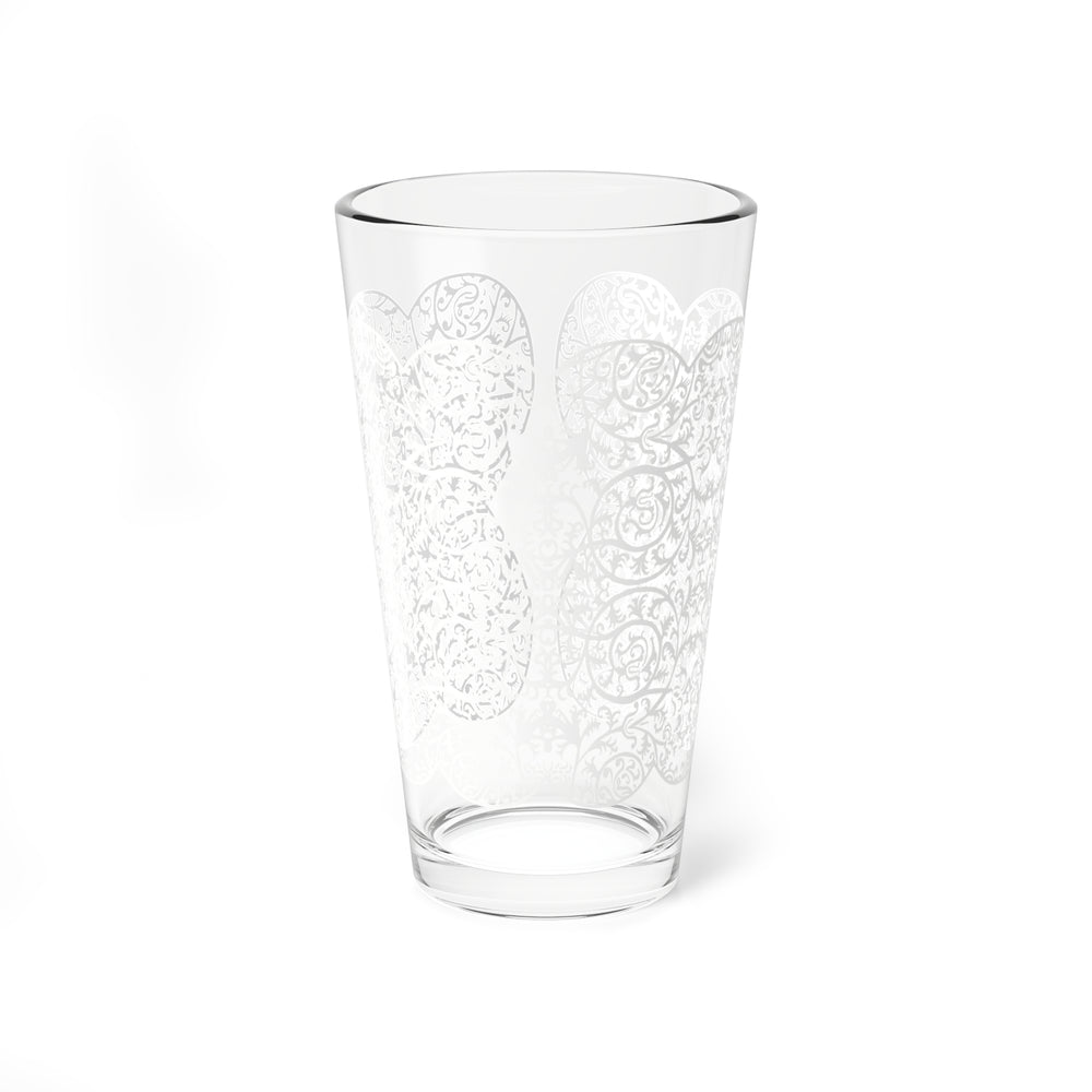 Clear glass with floral embossing on a white background