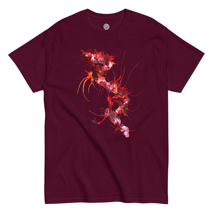 Maroon t-shirt with a red and white painterly design on a white background