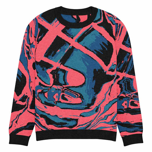Knitted sweater with abstract design in pink, blue, and black on a white background