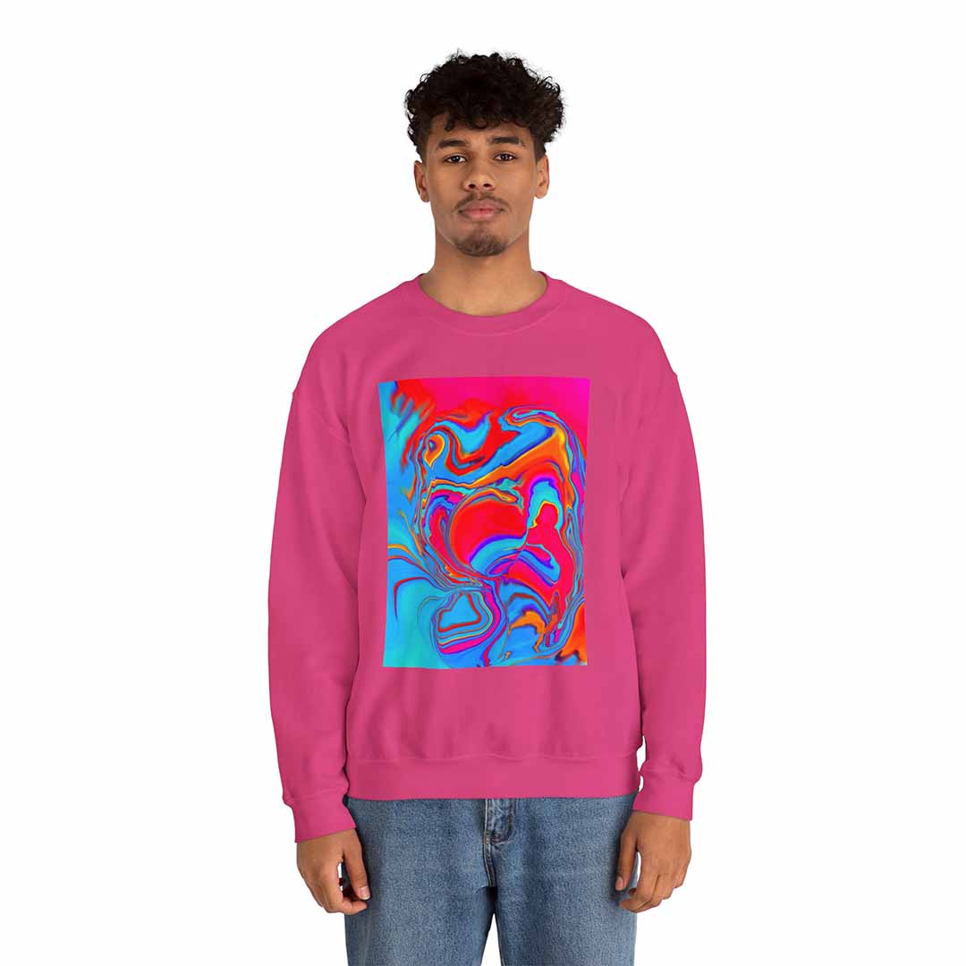 Person wearing a pink sweatshirt with a colorful abstract design on a white background