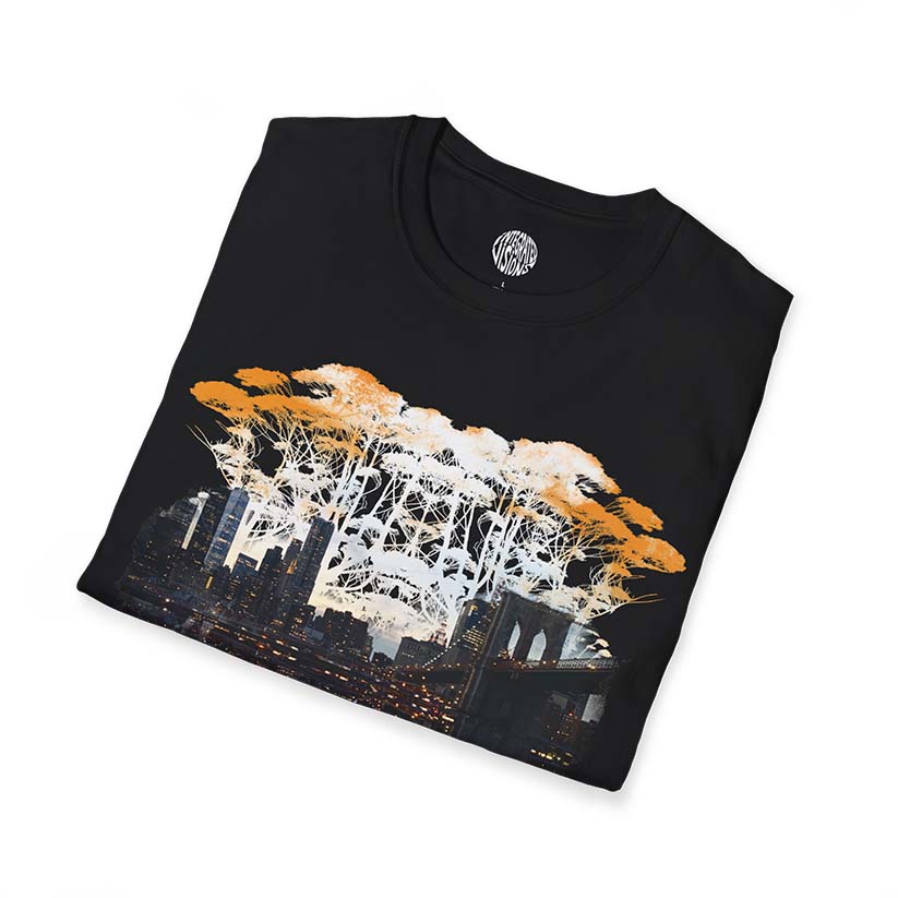 Folded black graphic t-shirt with print of trees and NYC skyline on a white background