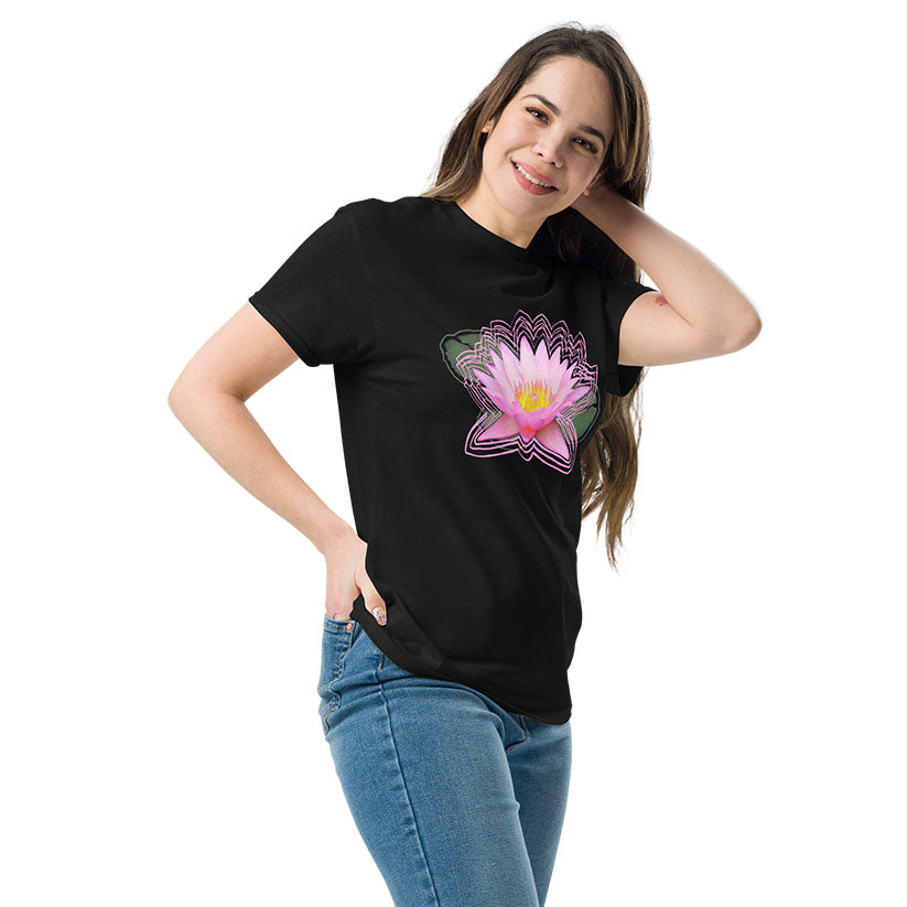 Woman wearing a black t-shirt with a pink lotus flower design on a white background