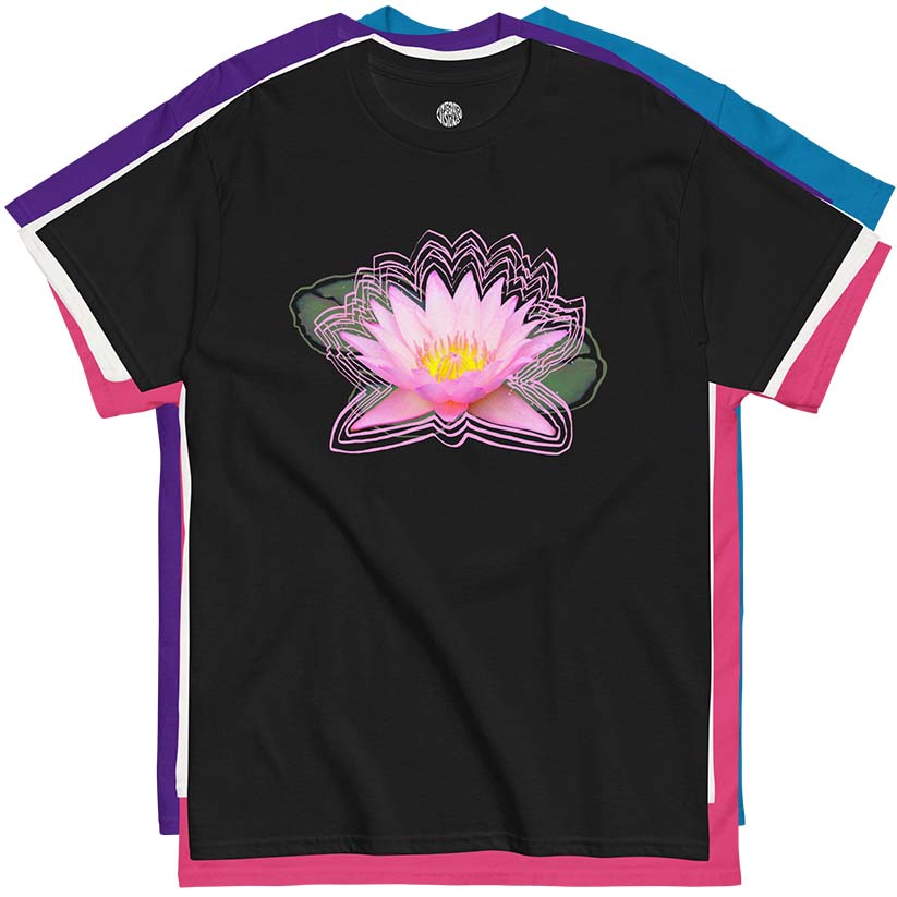 Black t-shirt with a pink lotus flower design laying on top of white, purple, pink, and blue t-shirts on a white background