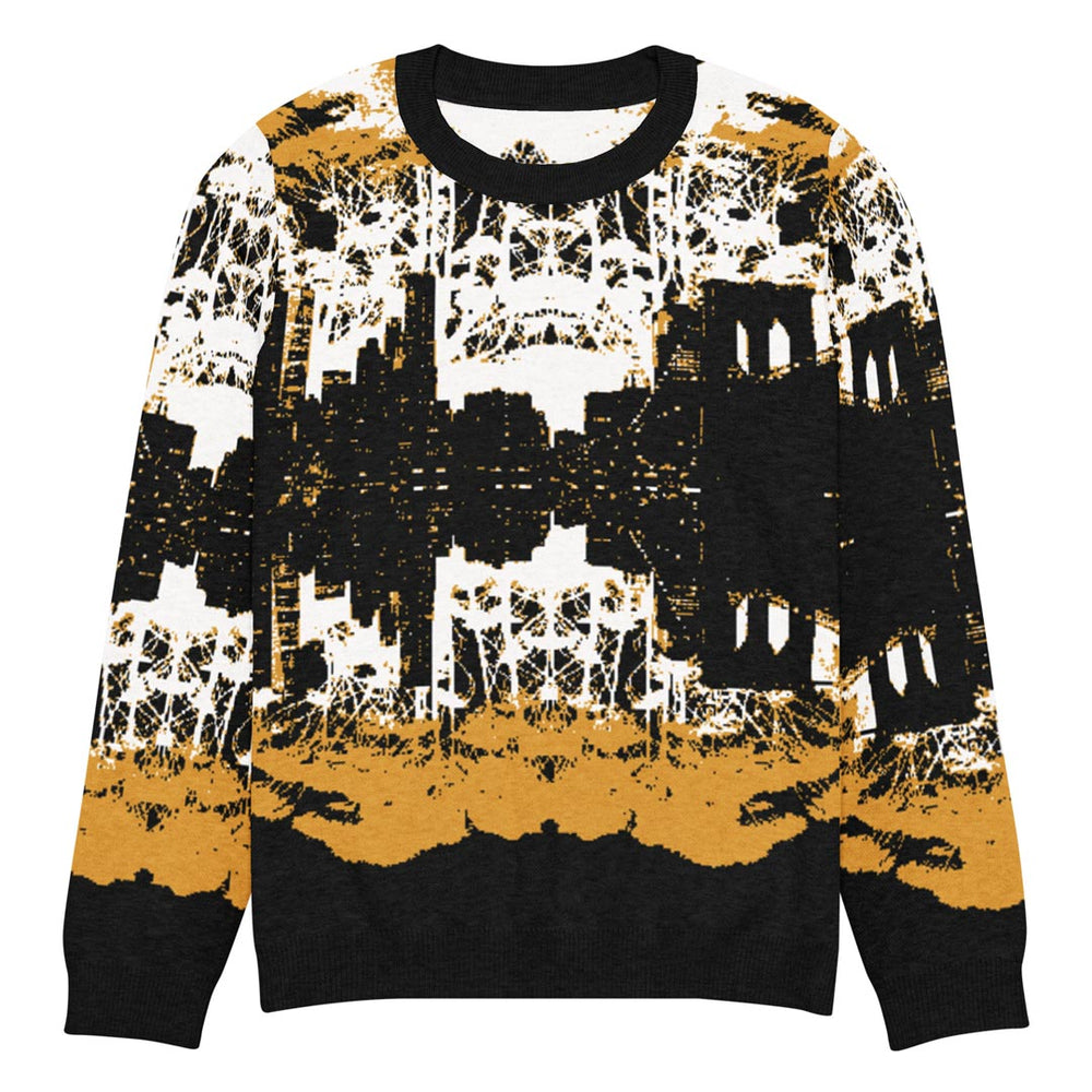 Sweater with cityscape design in black, white, and gold on a white background