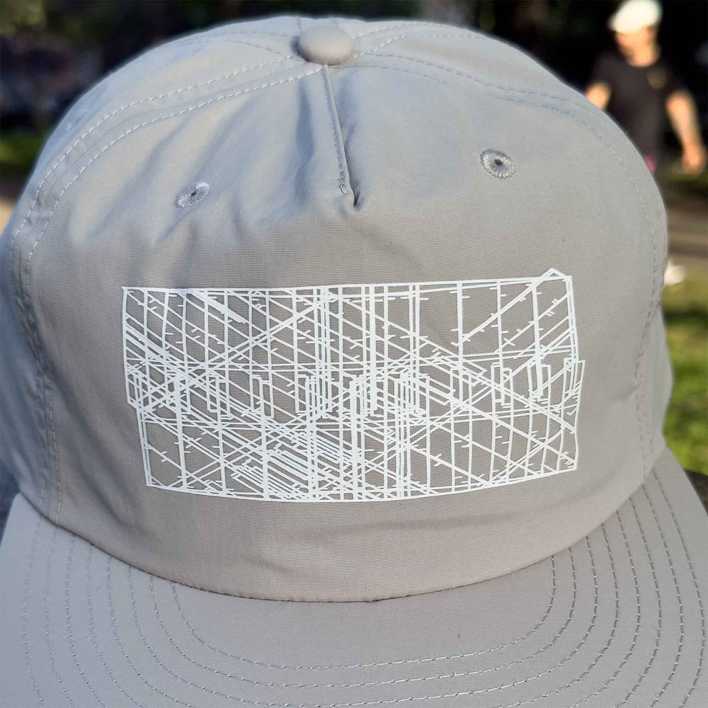 Detail of Eco-Conscious Recycled Nylon Surf Cap Hat with white Digi Board Lines on Storm gray hat.
